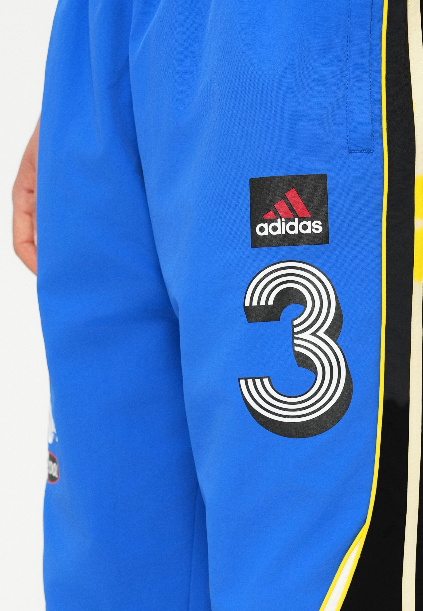 GFX TRACK PANT UNISEX - Tracksuit bottoms - blue/black/white