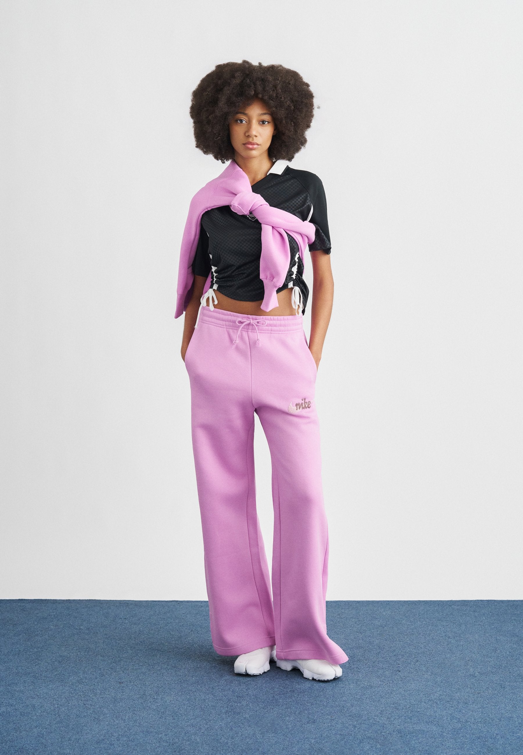 LOGO - Tracksuit bottoms - magenta/pink foam