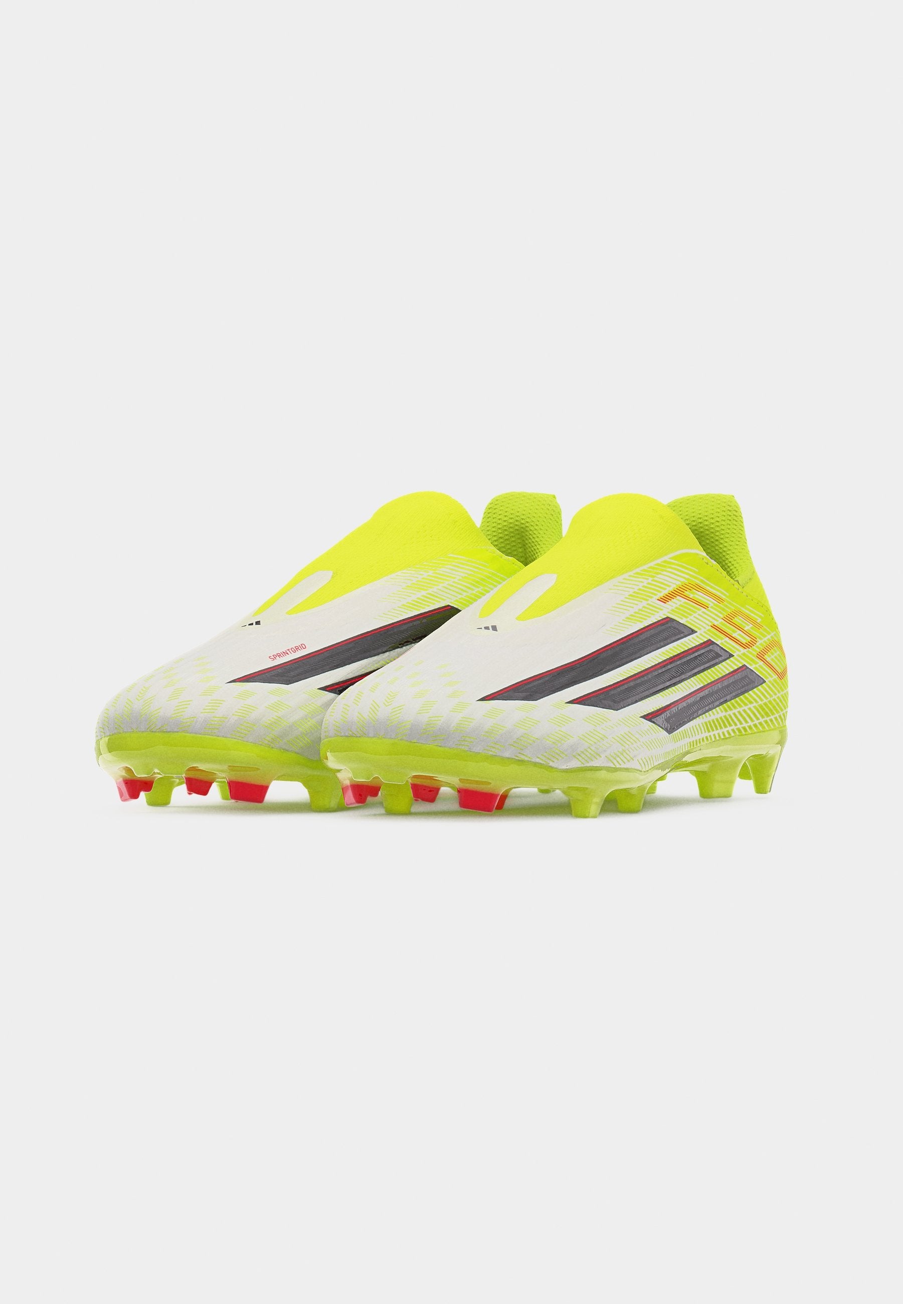 F50 LEAGUE LACELESS FIRM GROUND / MULTI GROUND KIDS UNISEX - Football boots artificial grass - team solar yellow 2/core black/lucid red