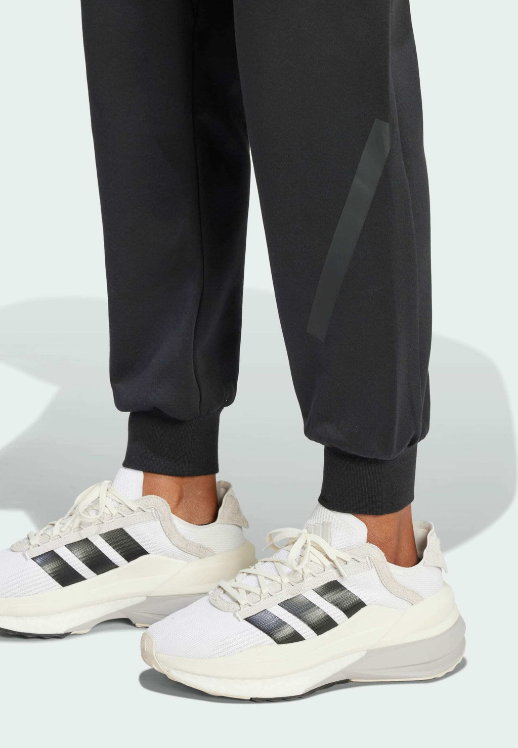 ADIDAS Z.N.E. - Tracksuit bottoms - black