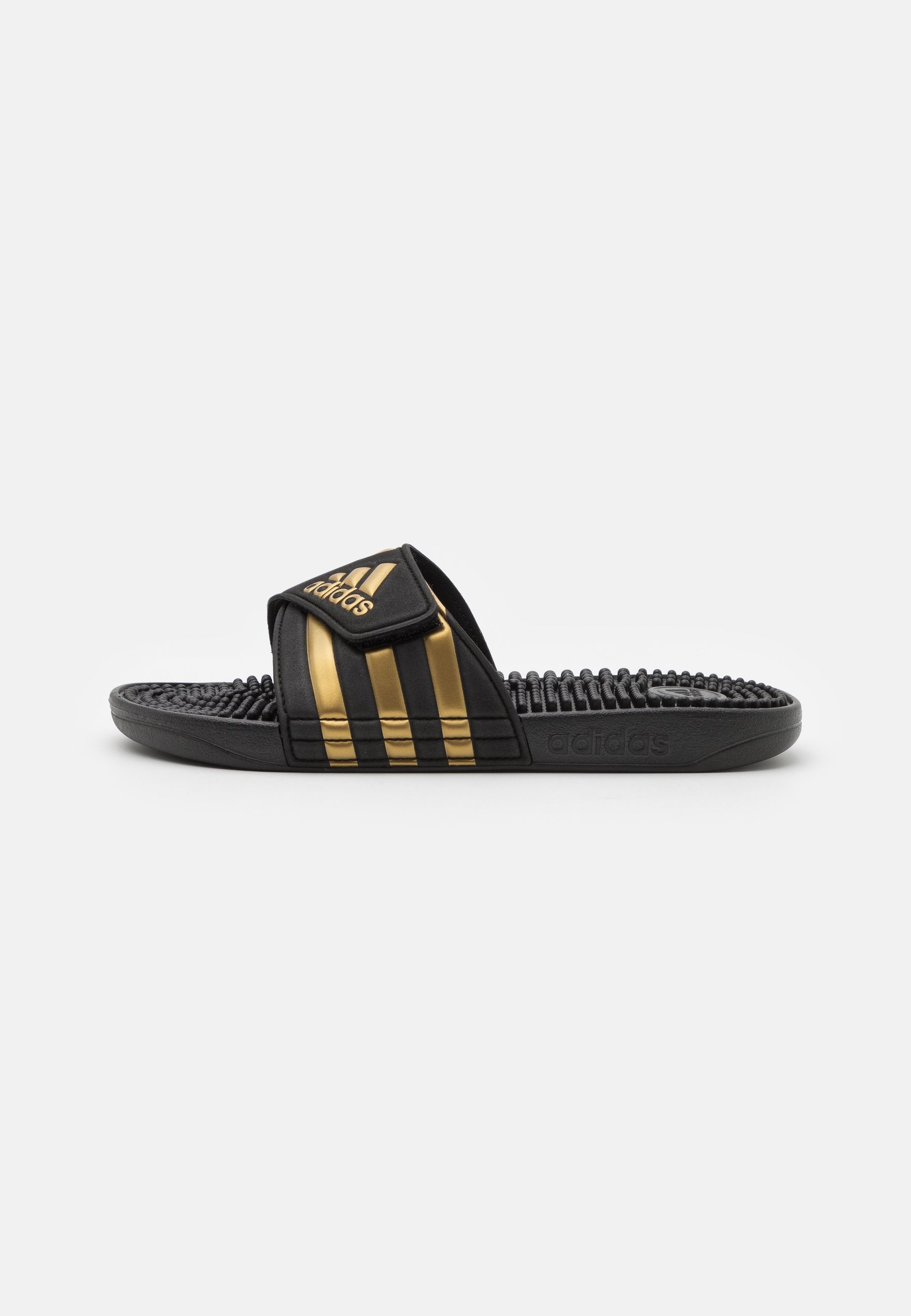 ADISSAGE - Pool slides - core black/gold metallic