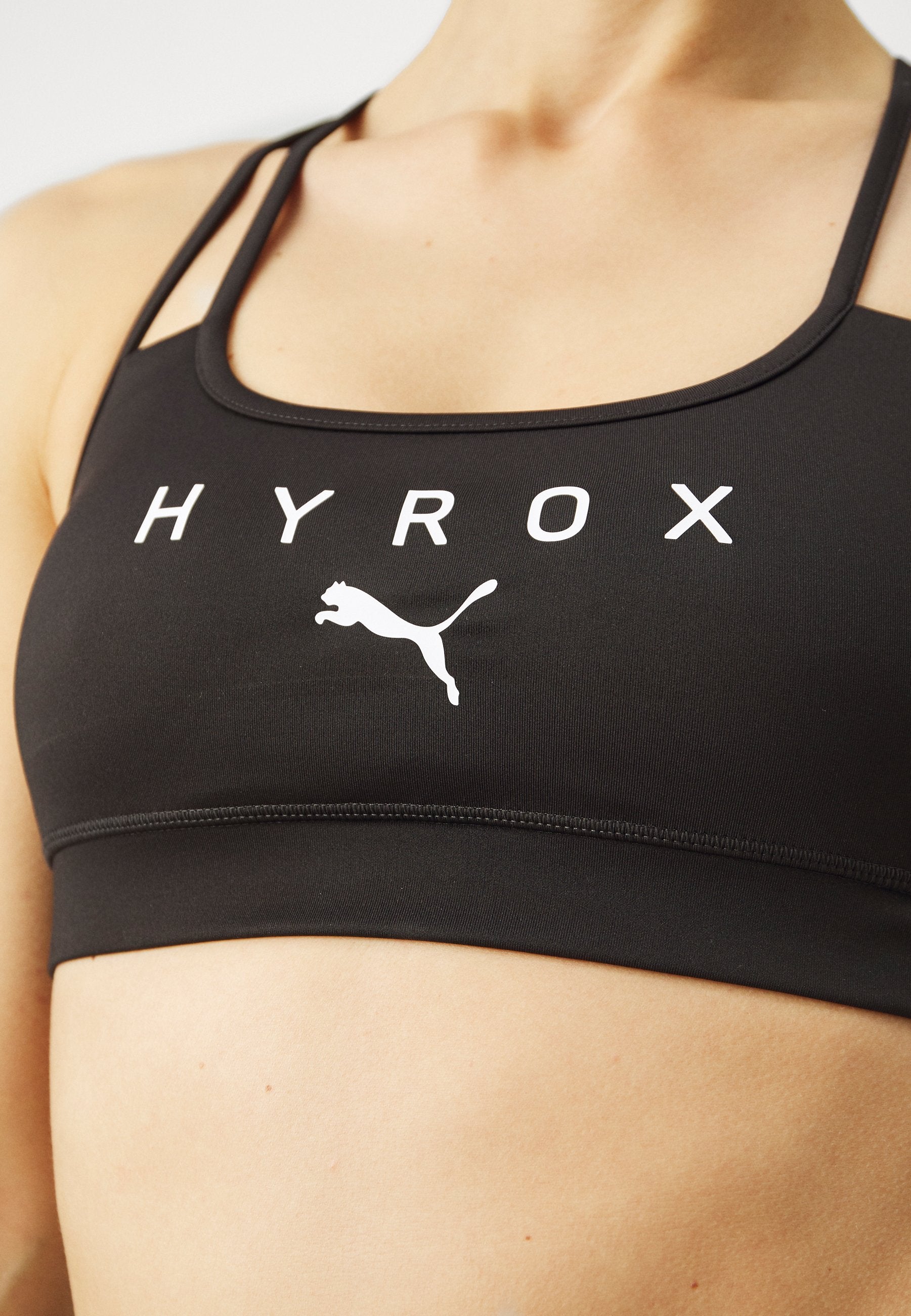 PUMA X HYROX MOVE STRAPPY BRA - Medium support sports bra - black