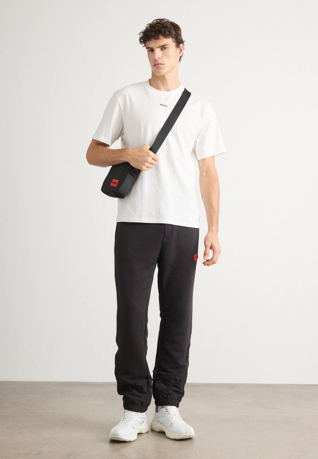 DILVANOS - Tracksuit bottoms - black