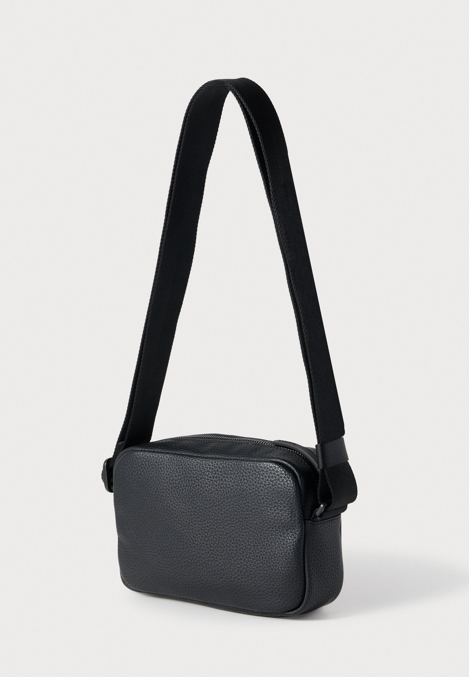 ETHON - Cross body bag - black