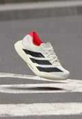ADIZERO ADIOS PRO 4 - Road running shoes - cloud white/core black/silver-coloured metallic