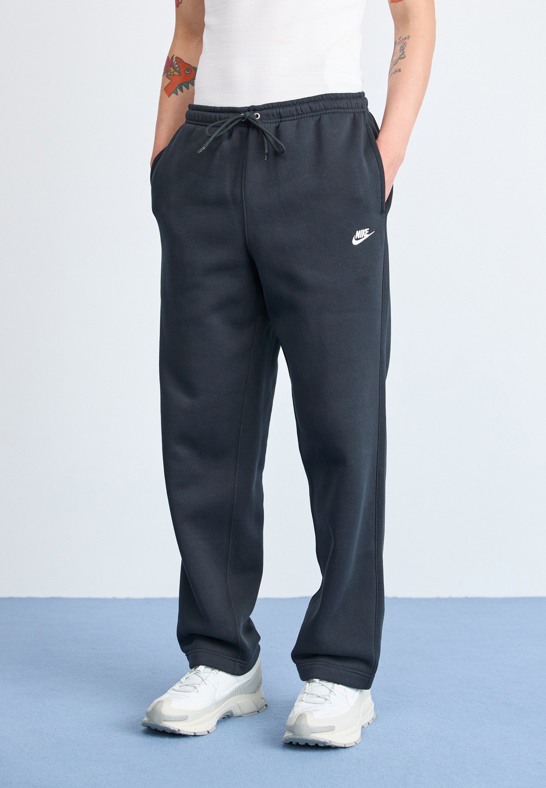 CLUB - Tracksuit bottoms - black