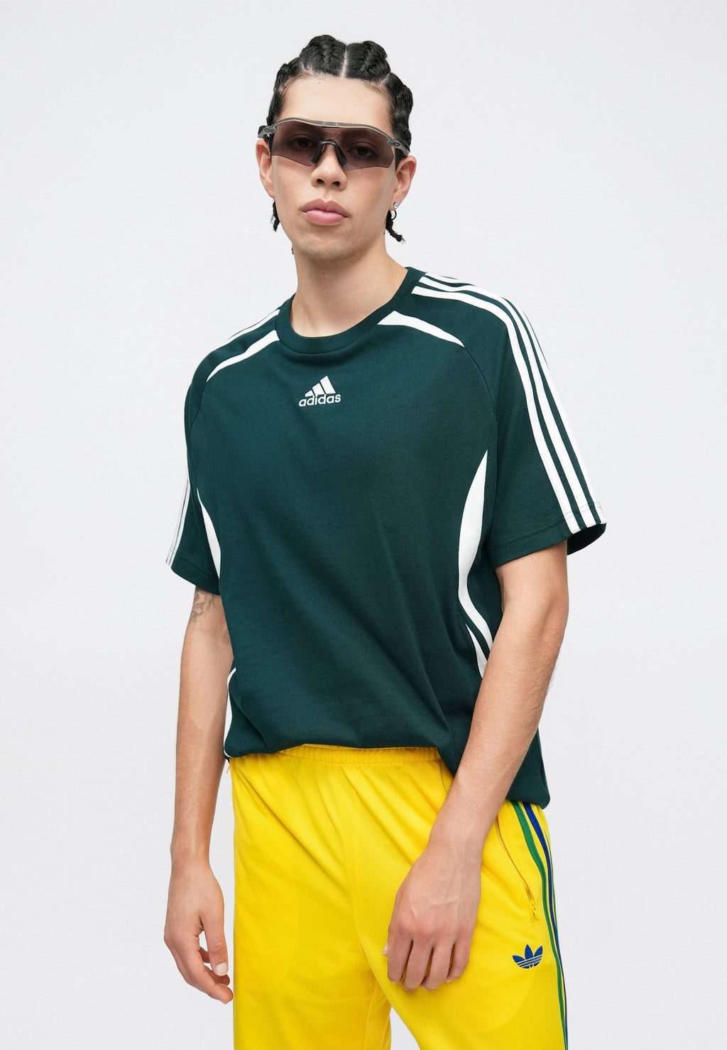 FIREBIRD TP - Tracksuit bottoms - yellow