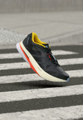 ADIZERO BOSTON 13 M - Road running shoes - carbon/core black/impact orange