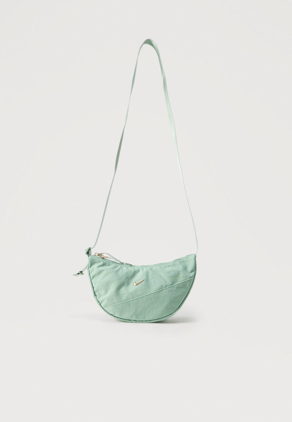 AURA CRESCENT CROSSBODY UNISEX - Cross body bag - mint/gold-coloured