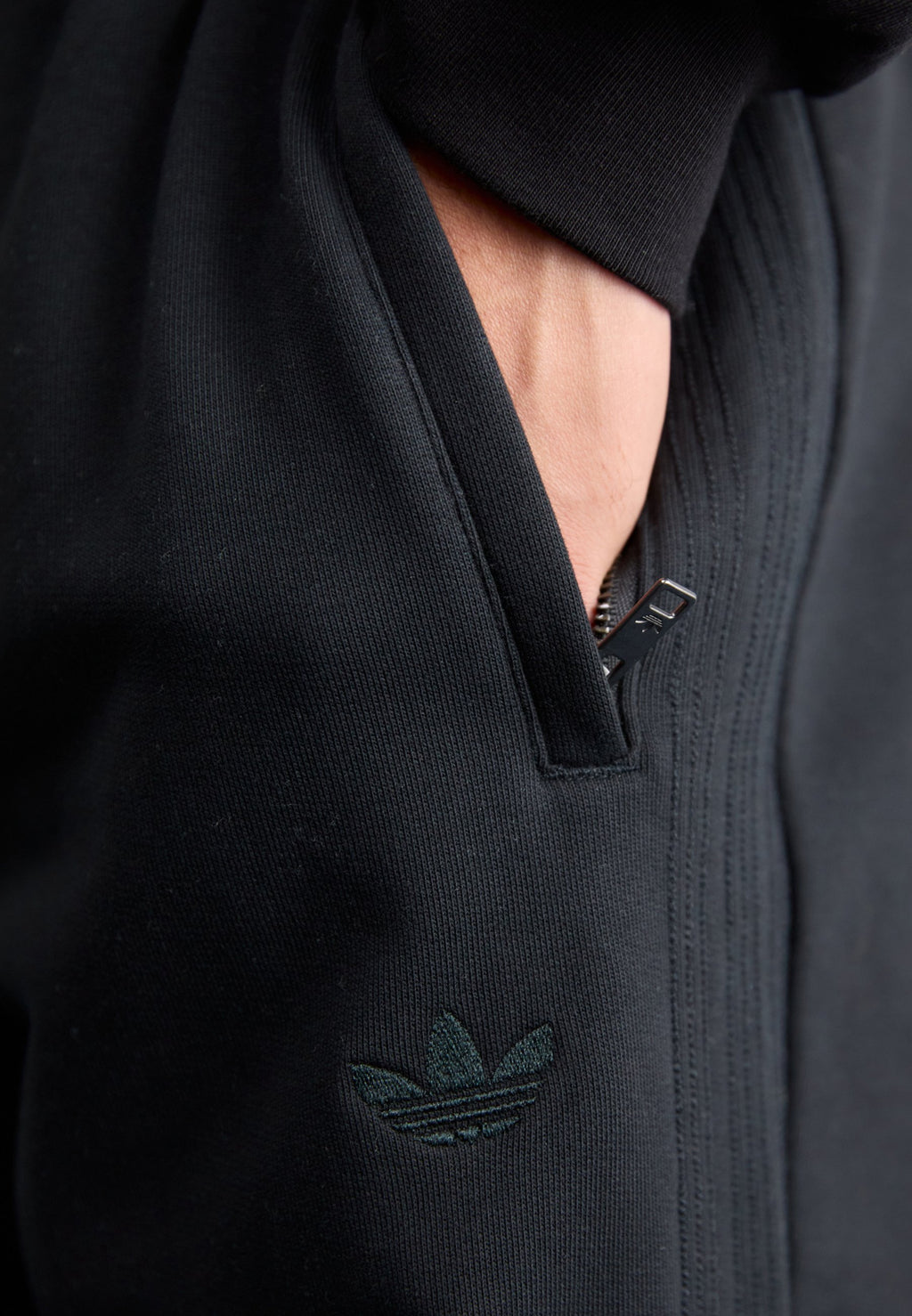 WIDE - Tracksuit bottoms - black