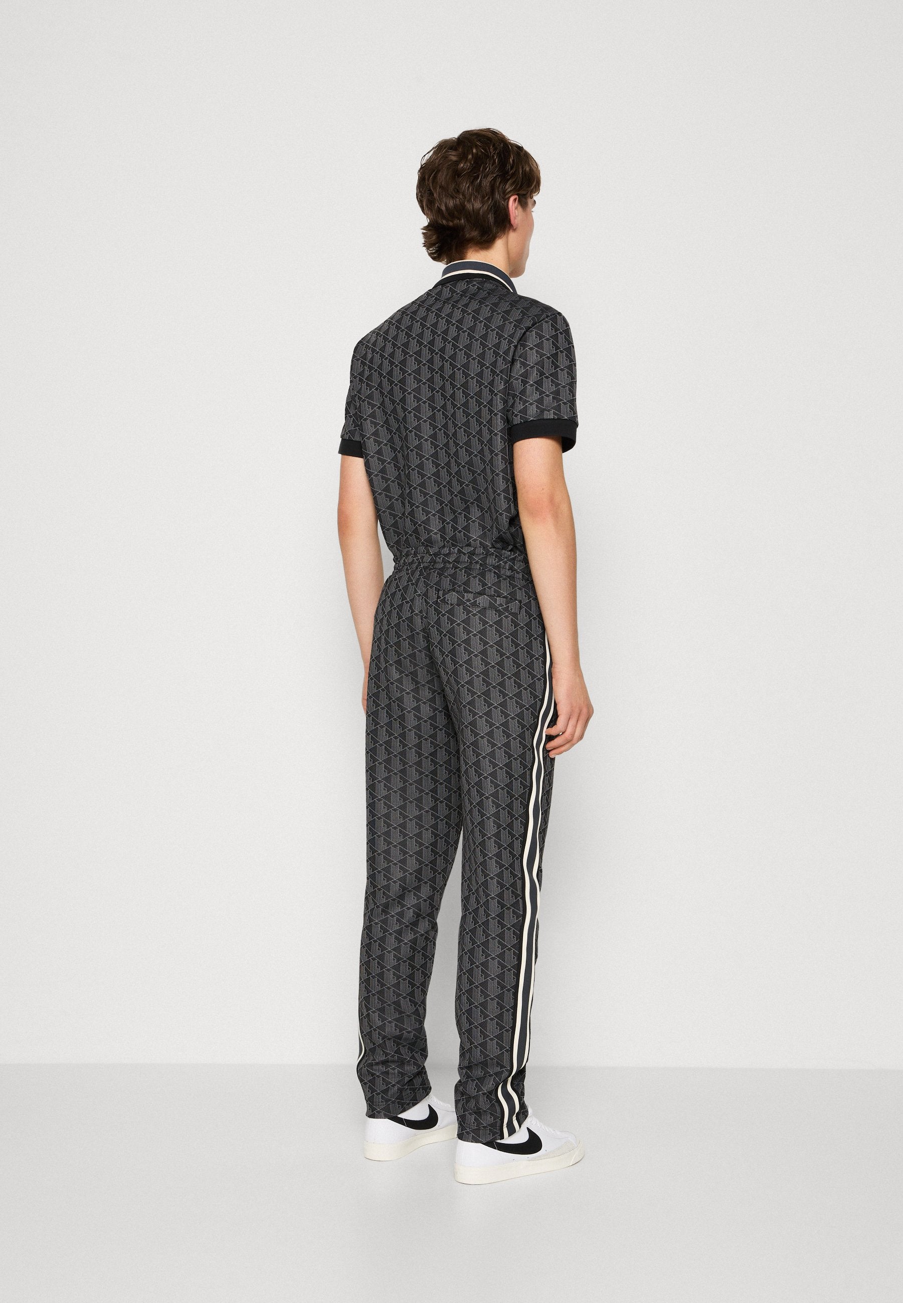 UNISEX - Tracksuit bottoms - black/graphite