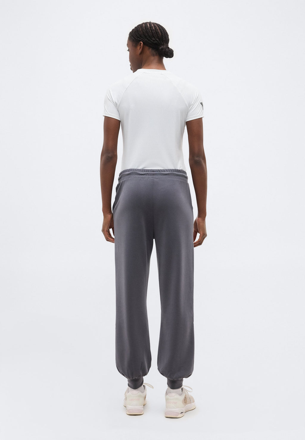 TRAIN CORE LADY RELAX - Tracksuit bottoms - gray