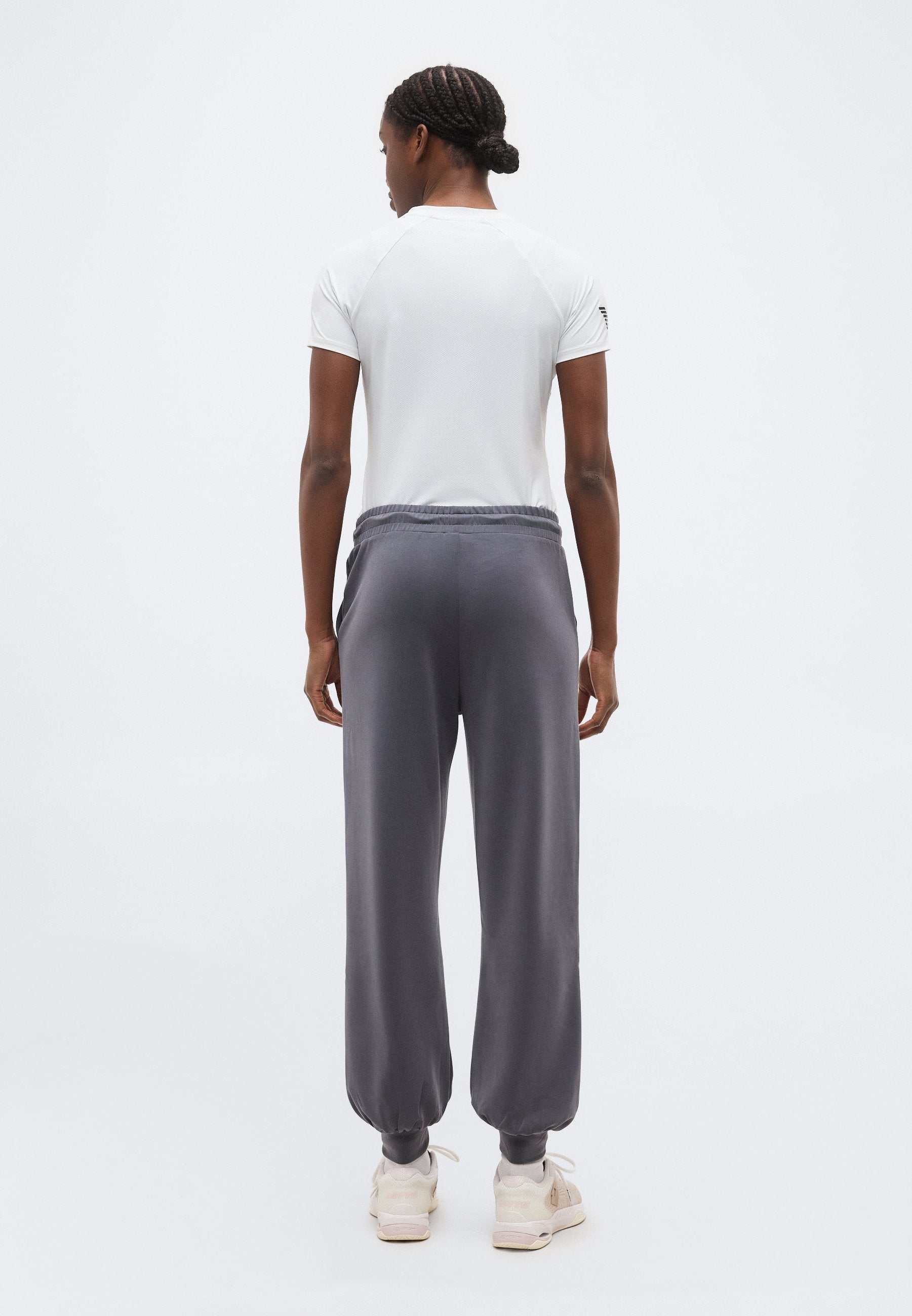 TRAIN CORE LADY RELAX - Tracksuit bottoms - gray
