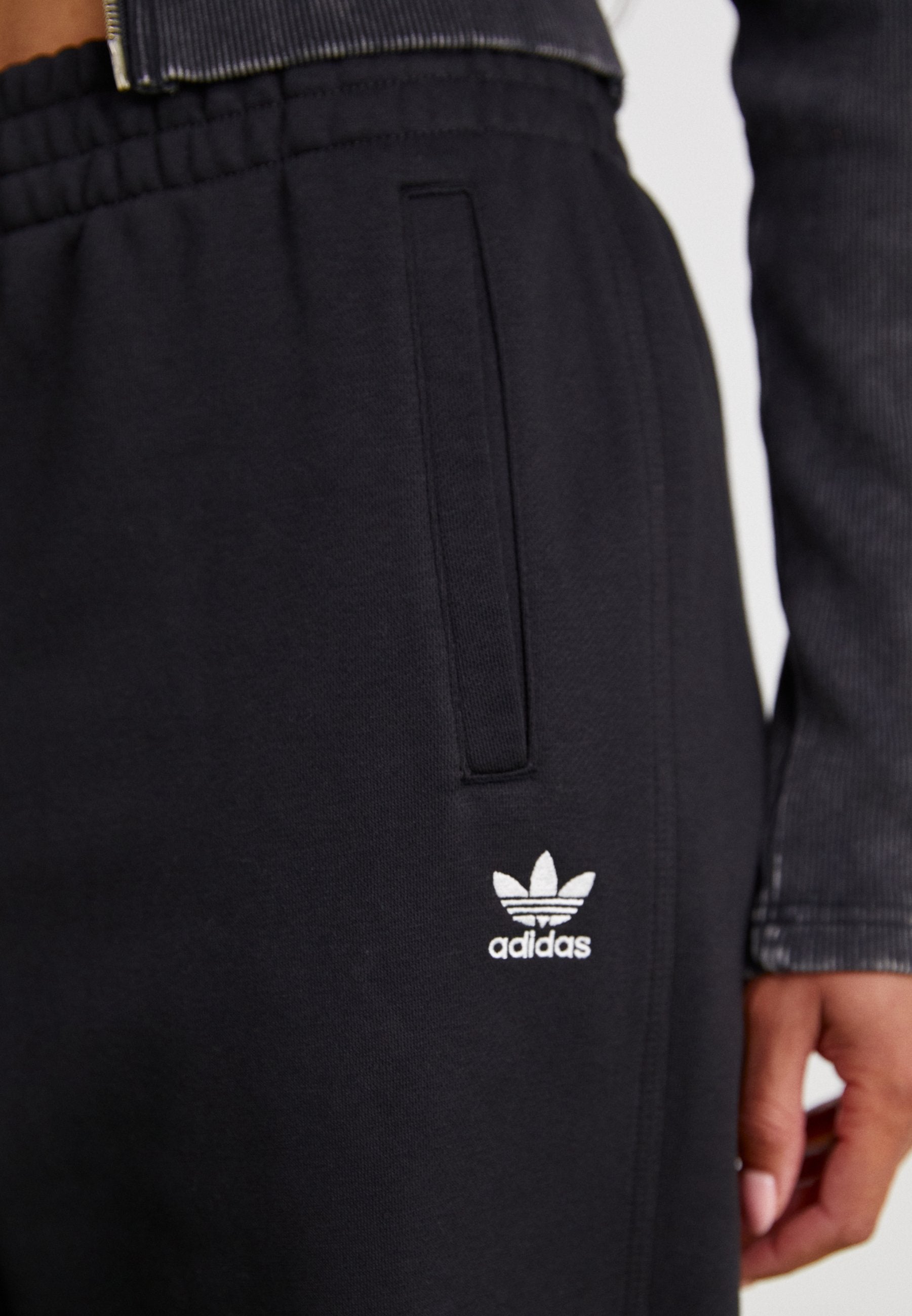 ESS JOGGERS - Tracksuit bottoms - black