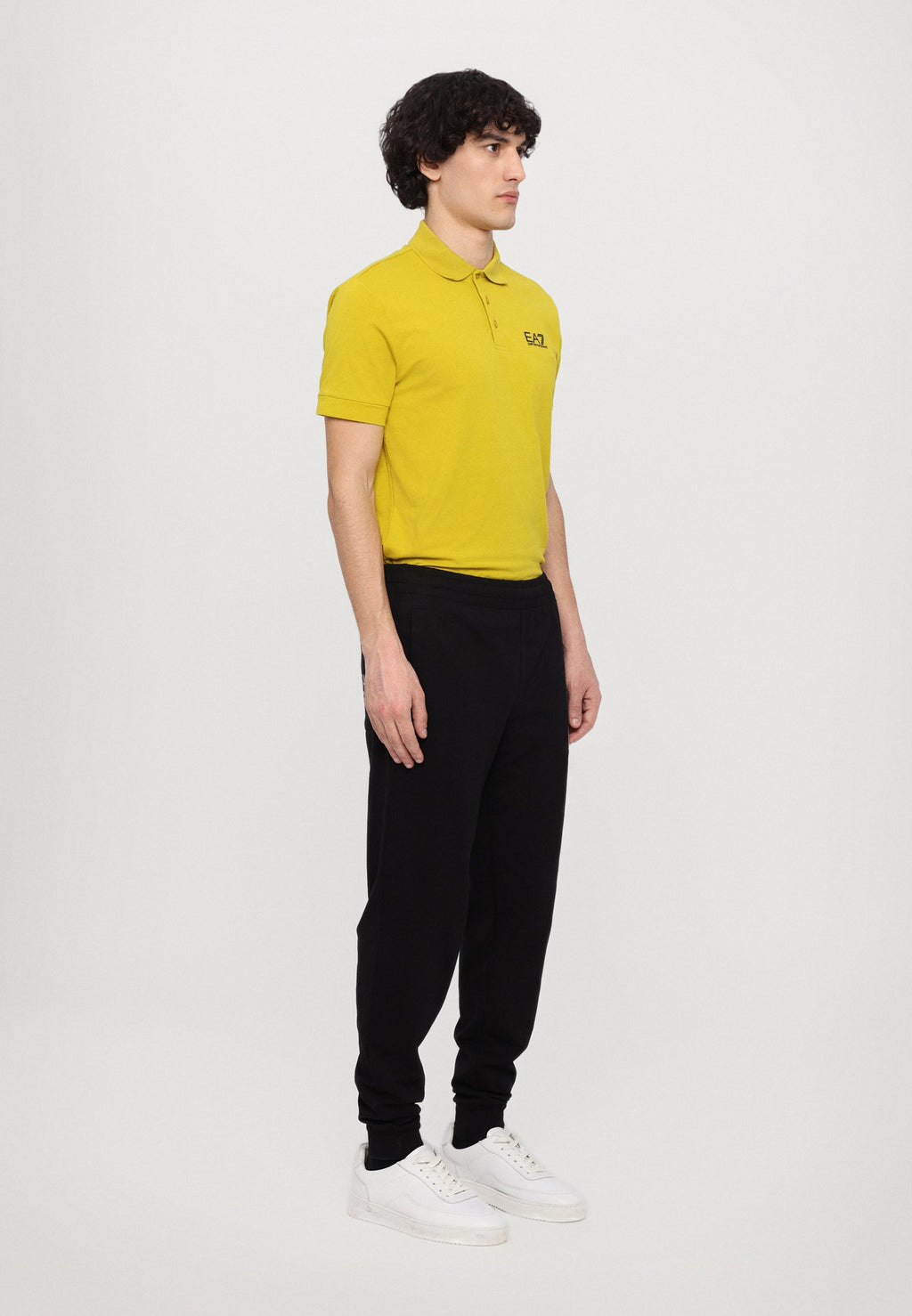 TRAIN LOGO SERIES PANTS  - Tracksuit bottoms - black/gold
