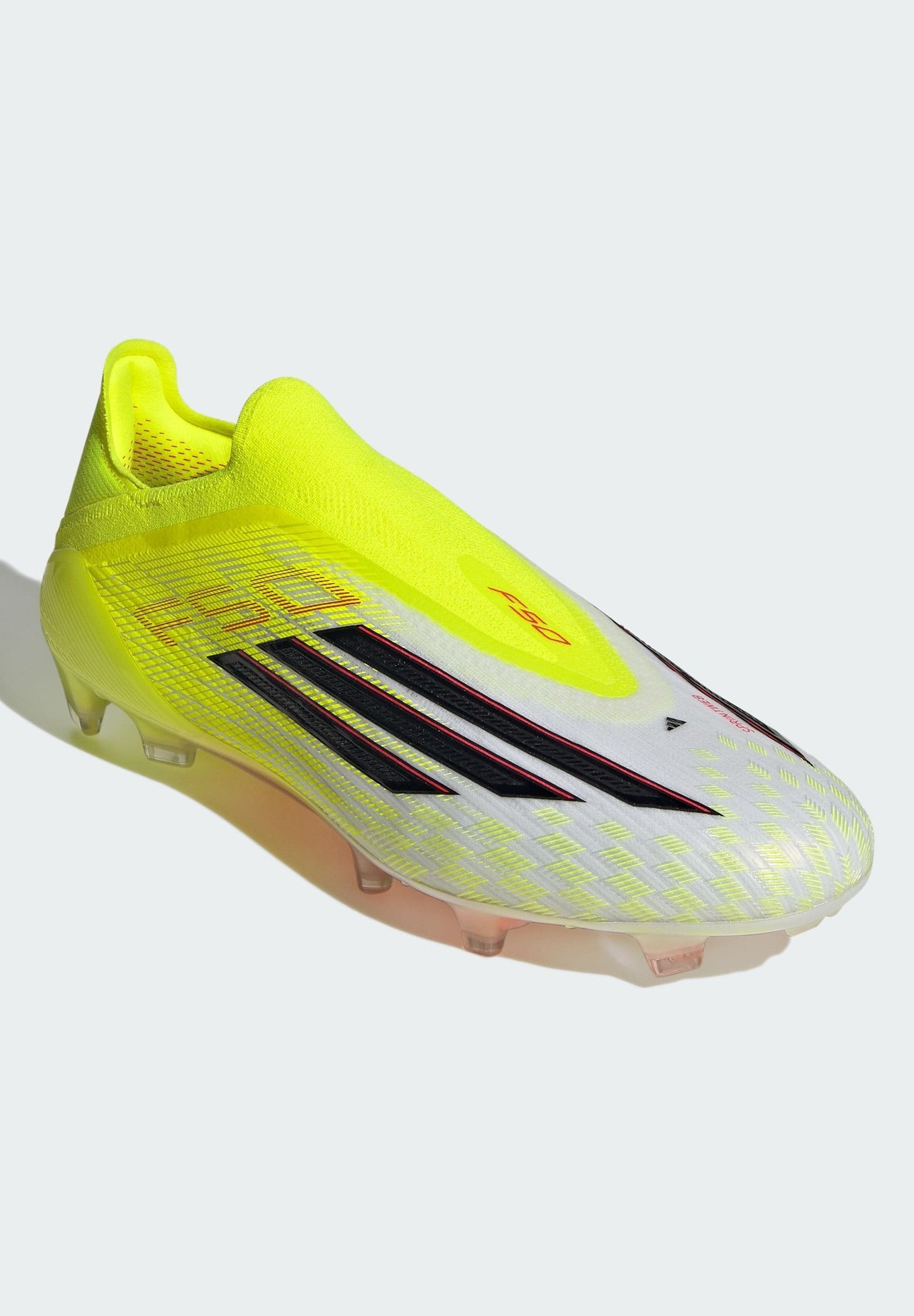 F50 ELITE LACELESS FG - Chaussures de football pour terrain sec - jaune solaire/noir/rouge vif
