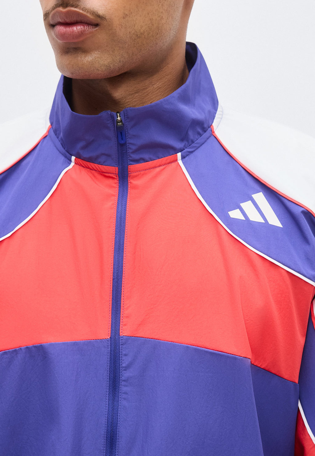 ADIZERO A JKT M - Windbreaker - dual indigo/semi lucid red/white