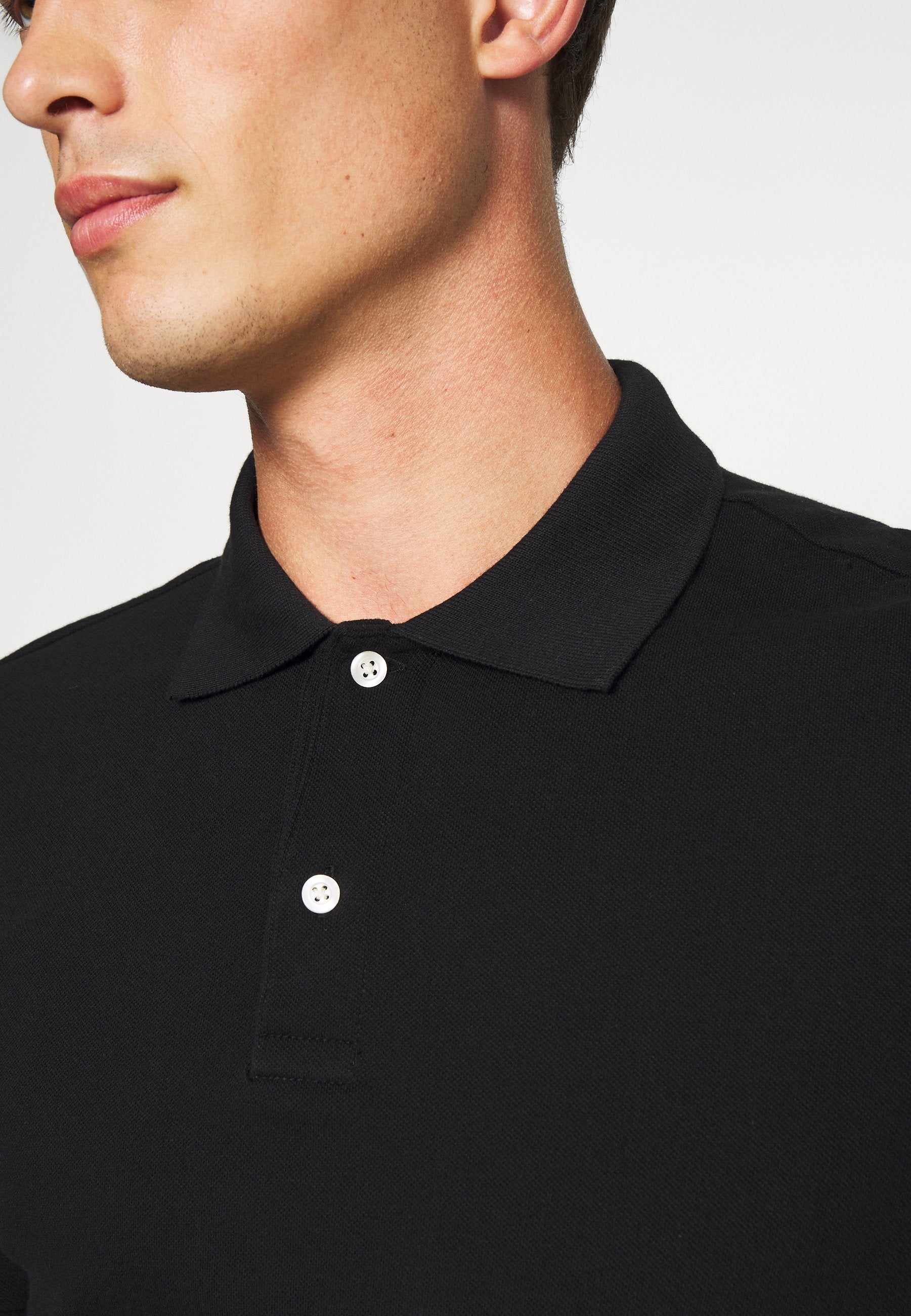STRETCH SOLID - Polo shirt - true black